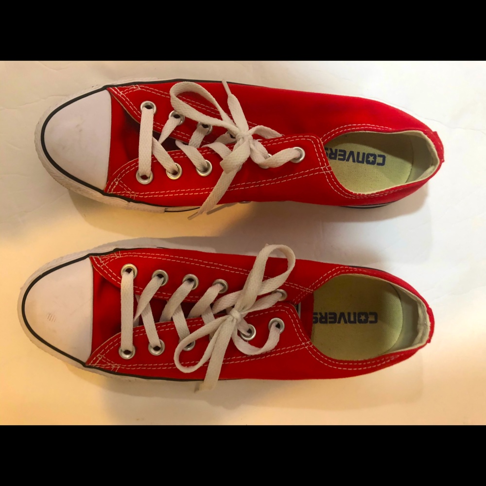 Gently worn red converse.
